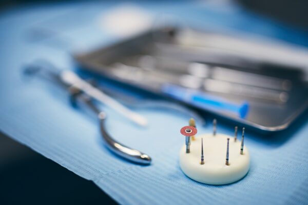 Close-up view of arrangement dental tools on tray in dental office.