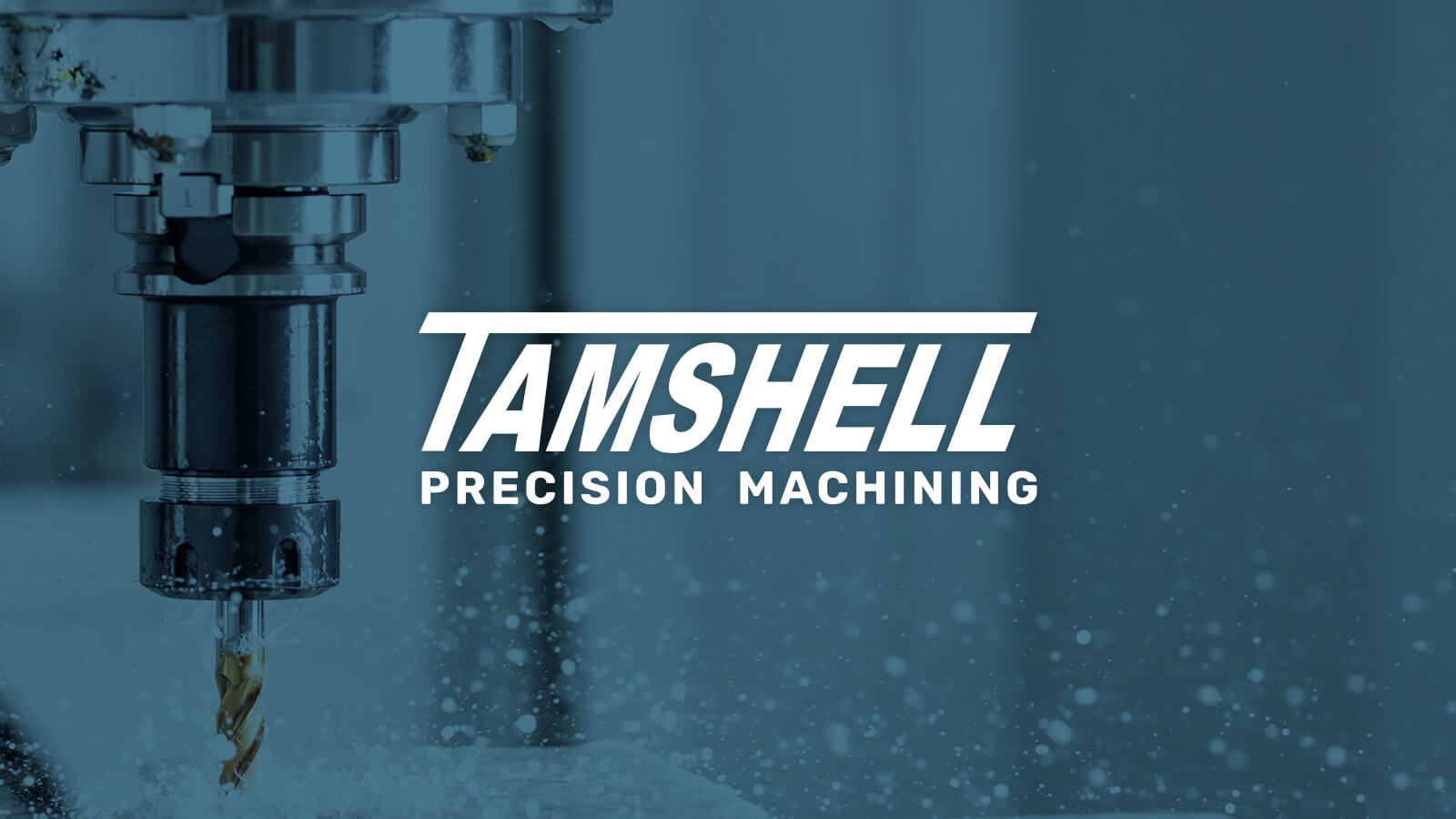 Tamshell logo against a background of cnc machining action